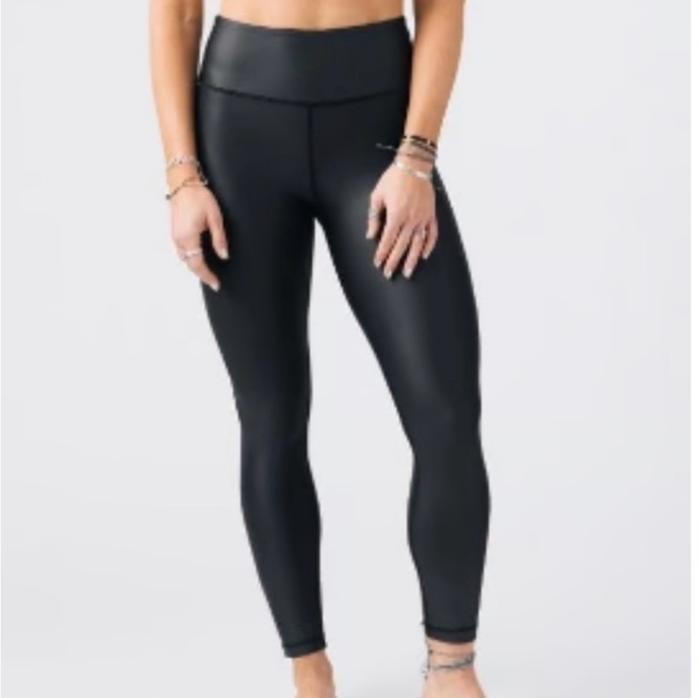 Brand new Zyia metallic leggings. New with tag and in the Zyia bag.